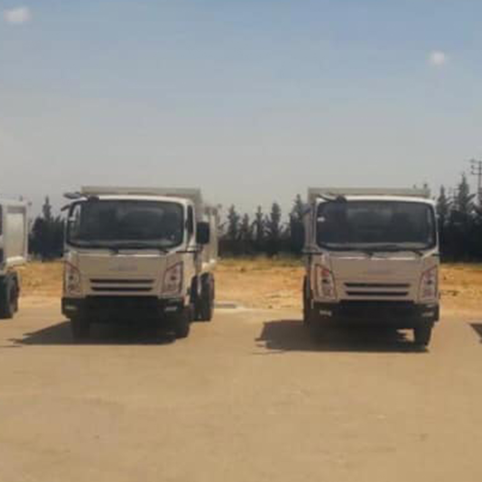 Four trucks to collect and transport solid waste provided by Japan